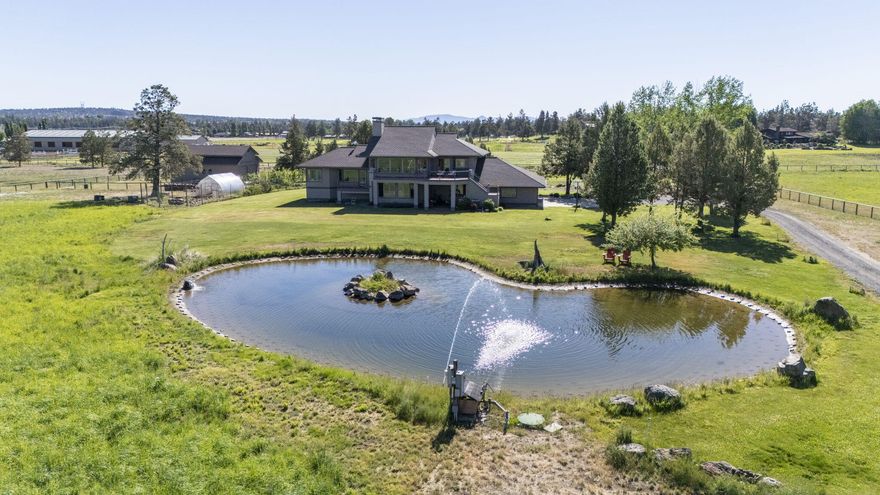 Discover your dream retreat: a 19.72 acre paradise with unrivaled mountain views! Welcome to a sanctuary of serenity and beauty, nestled in the heart of nature. This exceptional property promises an unparalleled living experience with breathtaking panoramic mountain views, stretching from Mt. Bachelor to Mt. Jefferson. With 16 acres of Swalley irrigation, a serene pond, greenhouse, and a 25x40 shop, this property offers limitless potential! The spacious 3,137 sq. ft. home is filled with natural light and boasts a thoughtfully designed layout with the primary bedroom located on the main level. Enjoy the magnificent views from east and west-facing decks, perfect for soaking in the stunning sunrises & sunsets. The lower level offers three bedrooms, one full bath, one half bath, a laundry and mud room, and a huge bonus room ideal for a yoga studio, media room, or school room. Here's your opportunity to own a piece of paradise, complete with modern amenities and endless possibilities.