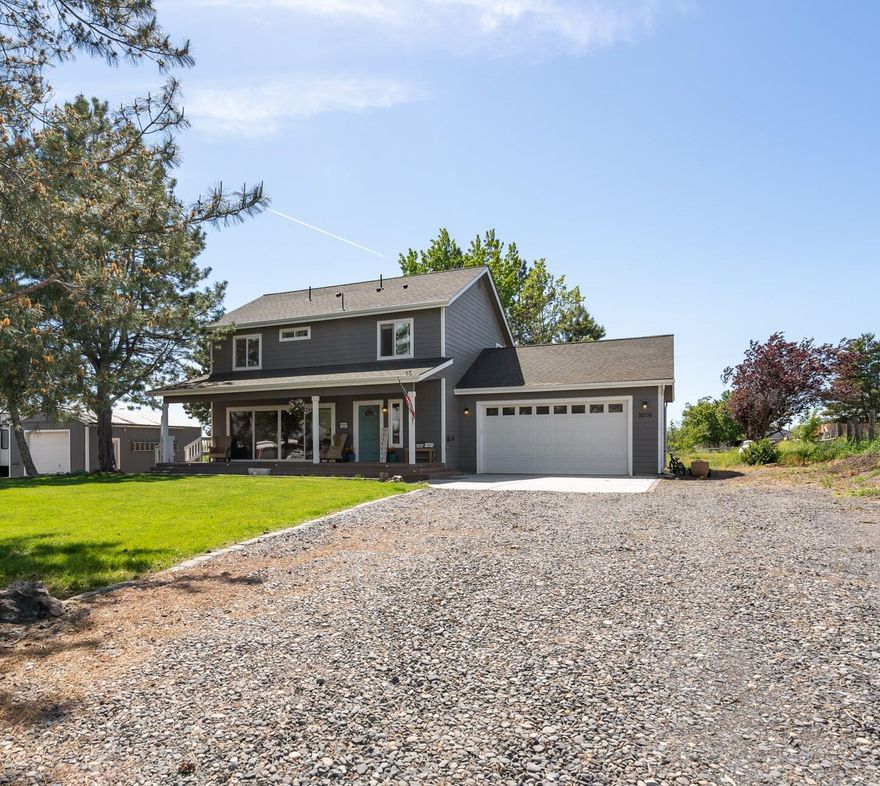 This is a beautiful farmhouse that is open and bright the minute you walk through the doors! Don't miss out on this 3 bedroom, 2.5 bathroom, an office,
attached garage and shop. There are 2 acres feels so private with irrigation, animal shelters and gorgeous landscaping. In the living room is a custom built
fireplace and the kitchen has been updated with a new sink and butcher block counter tops. This is a place to call home!