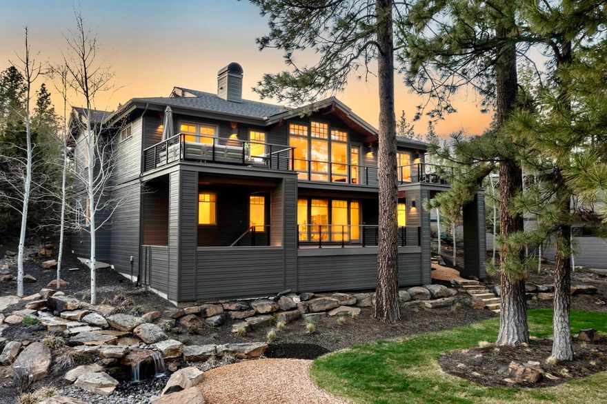 Come experience all that Bend has to offer from this expansive retreat in The Reserve at Broken Top. Nestled in the pine trees on a spacious lot providing peaceful outdoor spaces with waterfall features and trail access out the back door, this custom Pacwest Builders home has a versatile layout for comfortable living and easy entertaining. Quality timeless finishes are coupled with numerous recent updates including refinished hardwood floors, new carpet, fresh paint inside and out, new decks and railings, resurfaced driveway, new furnace, 10.5kW solar array and EV charger. Main level primary, 2nd ensuite bedroom and plenty of room for work, play or relaxation with rec room, 6th bed/bonus and equipped theater room. The ideal location provides effortless access to Phil's Trail complex and the National Forest for endless recreation while maintaining convenient proximity to NWX and Galveston corridor shops and dining and top westside schools. A perfect base camp for your lifestyle!