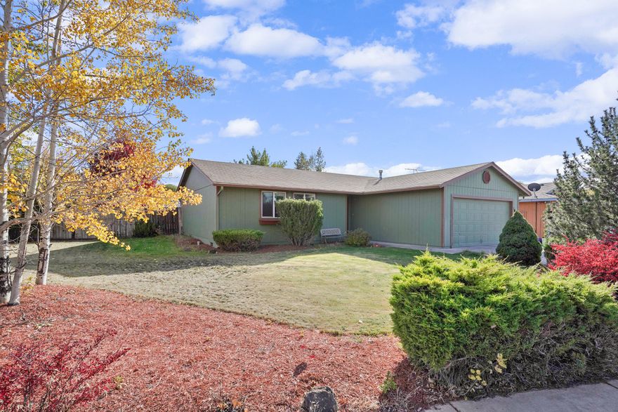 Recently updated ranch located on a corner lot with mature landscaping and trees. This charming home features an updated kitchen with a subway tile backsplash, a gas stove and brand new refrigerator.  Both bathrooms were updated as well as new laminate and tile flooring, windows, doors, crown molding, and interior paint. The exterior features new paint, a large front and fully fenced back yard, and patio. Located close to the dry canyon, trails, Quince park, and schools- don't miss seeing this one!