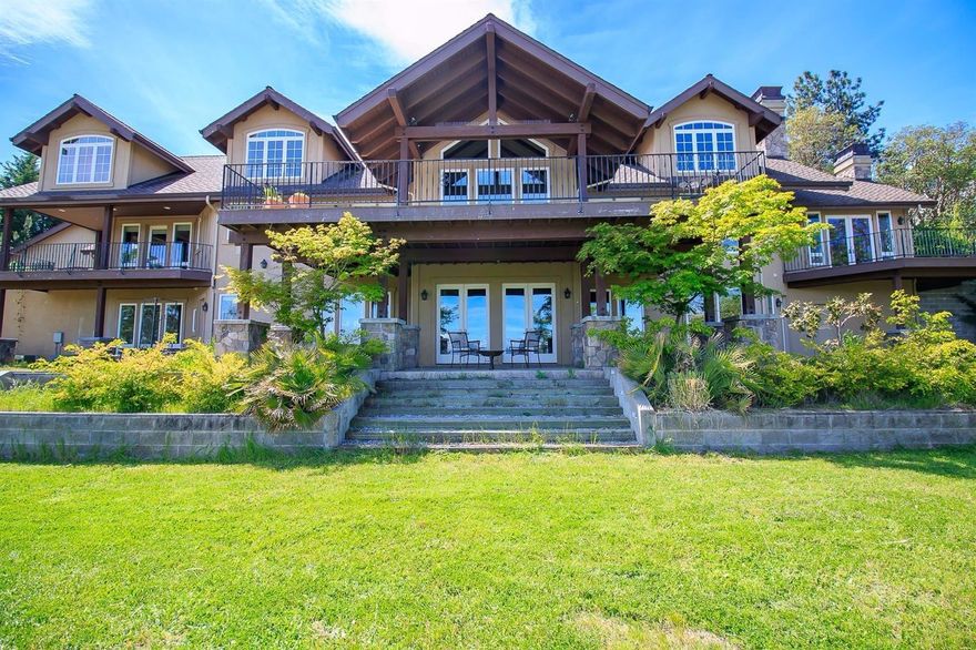 Would you like to live in the heart of Southern Oregon's wine country, in a charming, historic town, with lots of fresh air, and little traffic? Would you like your home to have a beautiful view of the mountains, and space to entertain, yet offer easy access to medical care, shopping, fishing and hiking? Your dream home awaits! This elegant hilltop home features a gourmet kitchen, two private main-level master suites, one with an ADA accessible bathroom making a perfect two family set-up. Downstairs has a family room, three bedrooms and two baths. Upstairs has an office space for work-from-home types, and a large bonus room that would make a perfect art/yoga studio. Also inc. is a detached shop that is heated and cooled for year-round projects. Watch the sunrise from the large deck and private balconies, cozy up to one of the three fireplaces, or venture out and enjoy all of the culture, arts, and cuisine that Southern Oregon has to offer! Please see attached video walk-through.