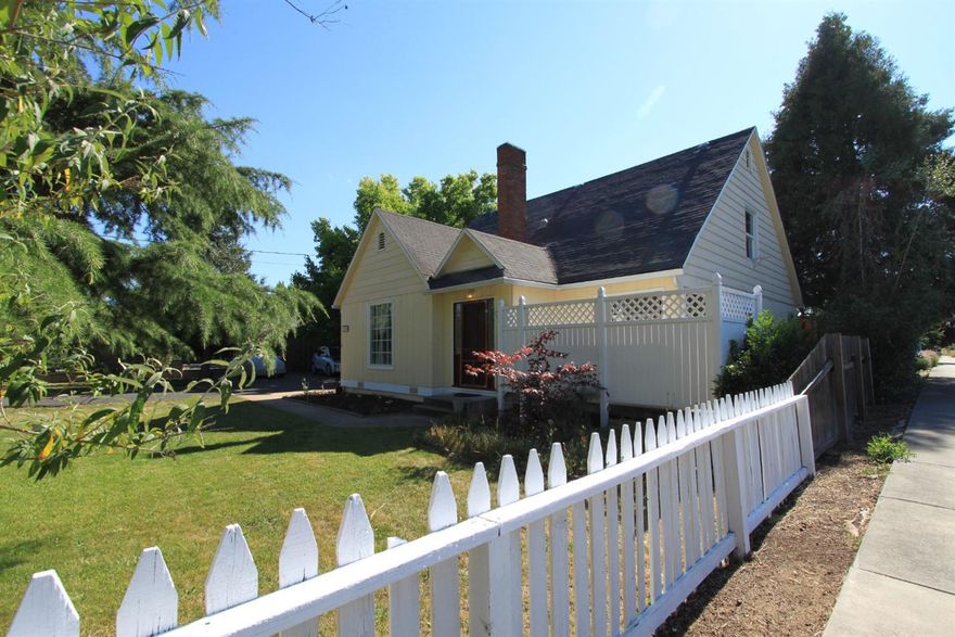 Great opportunity . . .Four bedroom two bath home with many recent upgrades. Large lot with a swimming pool, shop, storage, tank less water heater and natural gas heating.