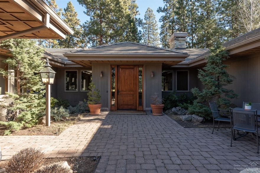 This coveted Broken Top single level home is the perfect blend of luxury, warm ambiance, layout and privacy for the most sophisticated buyer. The master suite includes an office with Ponderosa and fairway views. The grand kitchen steals the show with a Butler's pantry, granite island and extensive counters with seating, all overlooking the lovely great room. A guest suite plus bedroom with a stone fireplace are tucked away in their own wing for welcoming privacy. This location in the desirable West side of Bend, Oregon, provides convenient easy access to biking and walking trails, Mt. Bachelor, shops, restaurants and so much more. Membership to Broken Top Golf Club is not required.