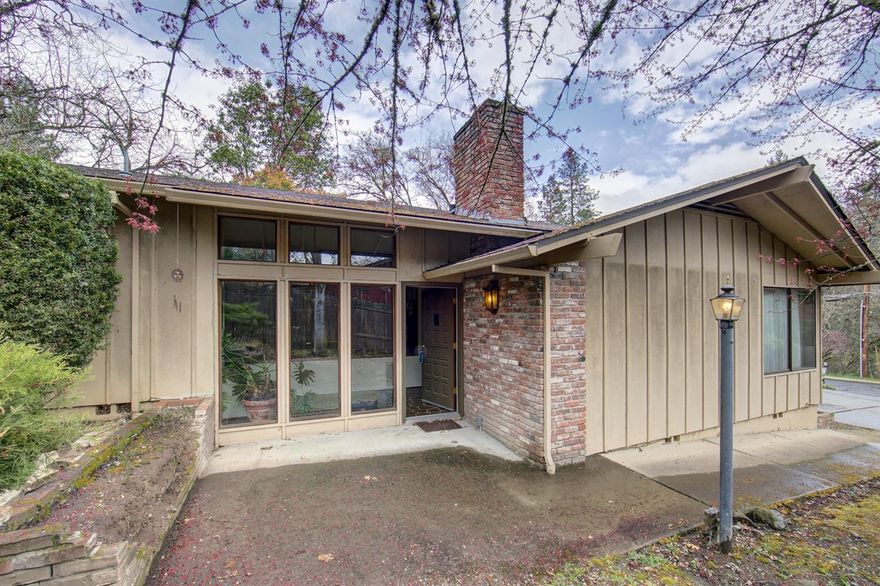 This home in a highly desired location is ready for your visions. The home is dated but very well maintained. Here is the opportunity to purchase a home and style it just for you. There is a brand new deck off the dining room just perfect for BBQ's and get together's. The 2 car garage offers a large additional storage work room. If you are looking for a retro home with a lot of character, this is the one. This home is close to everything that makes Jacksonville so desirable. This split level home is on a usable .29 acre lot. If wildlife viewing is something you want in your new home, look no further. Deer, turkey, and several other types of wildlife come right through the yard. Sit by the large windows and watch them pass by.