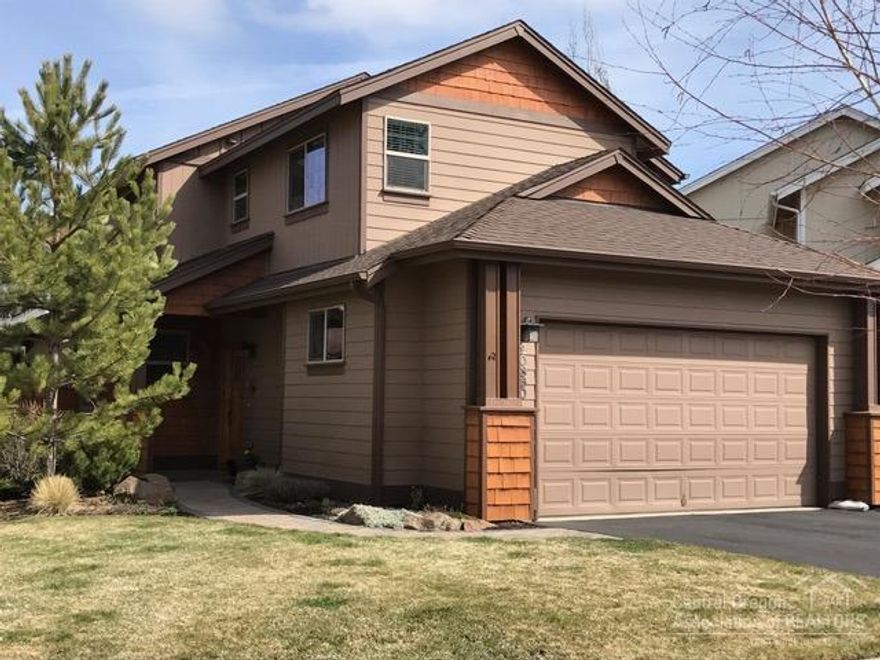 Wonderful turnkey home centrally located to so much! Downstairs offers real hardwood floors, a den/office, open living with the great room, dining area and kitchen. The kitchen offers stainless steel refrigerator and a gas range. Upstairs you'll be delighted with a large loft at the top of the stairs, 2 bedrooms and a large master bedroom with dual sinks in the master bathroom and a walk-in closet. Along with the gas fireplace in the great room, there is also central forced air and AC.