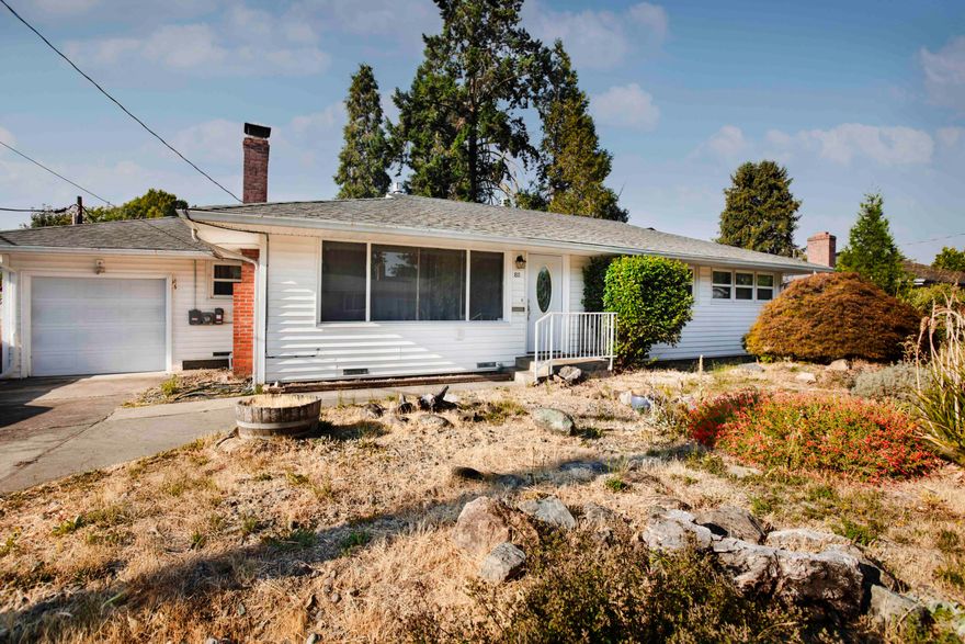 Discover the perfect blend of comfort and charm in this delightful 3-bedroom, 1-bath home, ideally situated near Grants Pass High School on a quiet cul-de-sac. Inside you find a beautifully remodeled kitchen with granite counter tops & tile backsplash. Recent updates, including a bathroom renovation, & recessed lighting add modern flair throughout the home.
Imagine cozy evenings by the fireplace, which is ready for a gas insert to enhance the warmth provided by the gas furnace.  The attached garage with a small office/pantry area & a covered storage area on a concrete slab, providing an excellent workshop space. Plus, you'll find a shed nestled in the expansive backyard.
The kitchen door opens up to a lovely concrete patio, perfect for hosting summer gatherings.
 With newly installed solar panels, your power bills will stay impressively low (12 month TOTAL was $203)—a fantastic benefit that continues even as the solar incentive program comes to a close at year's end