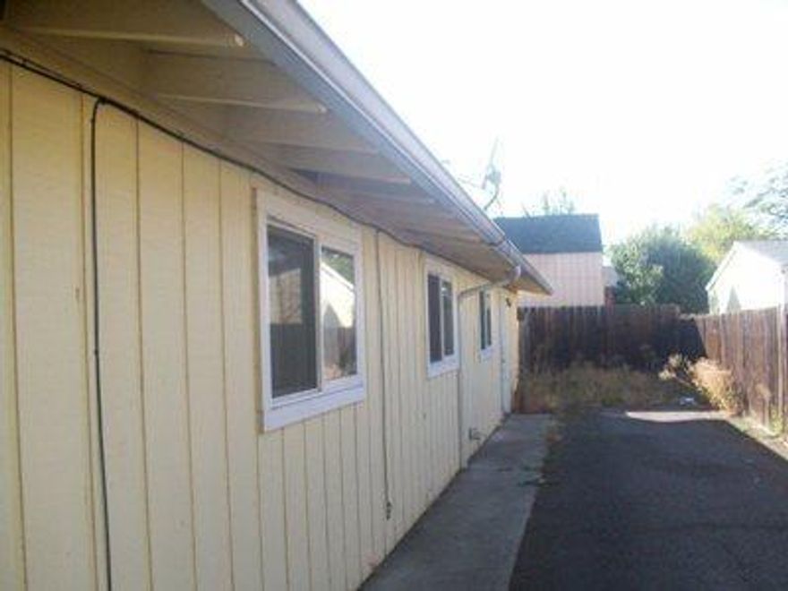 Great opportunity for rental income. 2 3bd/1ba units. Large square footage, nice fenced patio on unit #216 with separate storage bldg for this unit as well. Needs new roof. Ask your agent for promotional information on this property!