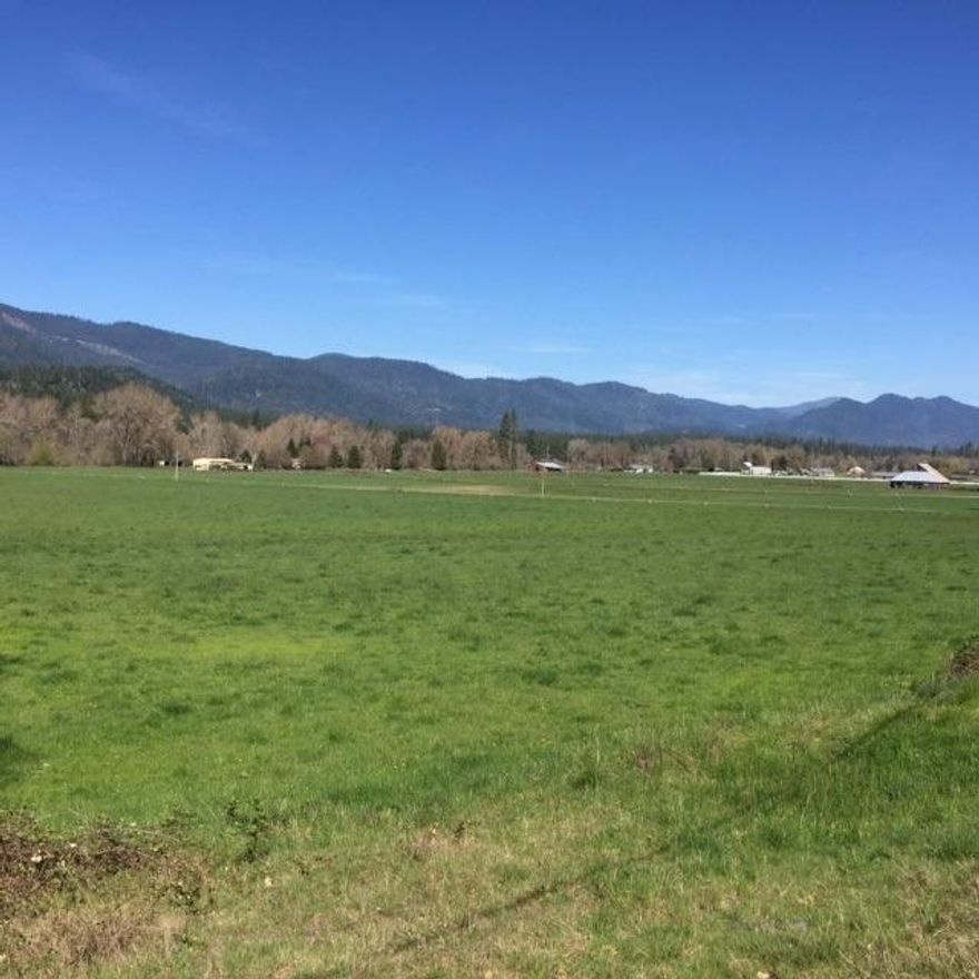 Two EFU zoned irrigated tax lots #1700 & 1701 currently share irrigation system with bordering property TL# 2000-2003 which is also on the market. These two lots have been used to produce hay and for grazing. The front lot has an old homestead near road and the second is a flag lot with year round Evans Creek along the back property line.