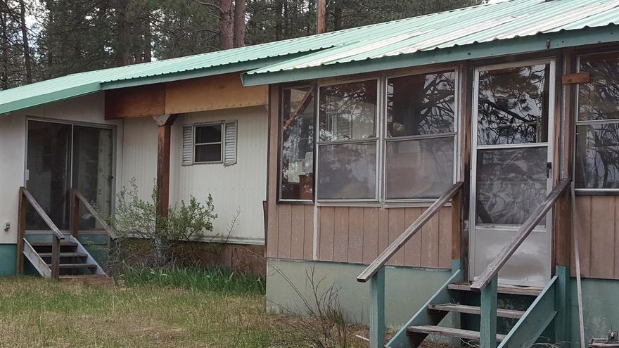 Priced for the property only. Older mobile that has not been lived in for over 7 years. In need of repairs or replacement. Power, well, and septic on property.