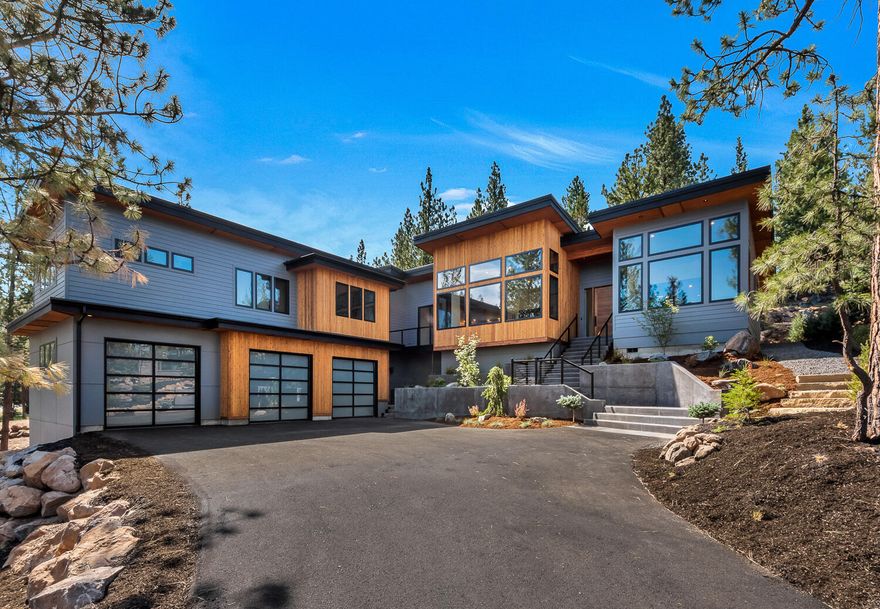 Spectacular Mountain Modern new construction on Awbrey Butte, in Glassow Heights.  Quality construction, superior craftsmanship and interior design throughout.  All main living space is on one level.  16' ceilings in great room with views of Mt.  Jefferson! 2922 SF  3 BR 
2 1/2 bath, plus an office / 4th bedroom and a flex/bonus area.  Well thought out floor plan, with separation from master and guest wing.  Amazing kitchen with tons of cabinets, counter space and Thermador appliances.  Beautiful woodwork and 8' doors, barnwood fireplace, steel accents, beautiful quartz, granite and tile throughout. Heated floors in master and guest baths.
Three car garage with finished floor, pre-wired for EV Charge and solar panels.
Paver patio with built-in gas fire pit.  Plumbed for gas grill and outdoor heaters as well.  Received approval for fence in back, one of the few spots on Awbrey that you can have a fence for your dog!  This Earth Advantage Home includes a 10-year homeowner's warrant
