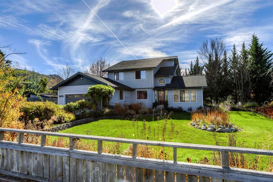 Outstanding Rural Home with Expansive Views Close to Ashland! This 3+ bedroom, 2.5 bath, 2,378 sqft home with 5 TID-irrigated acres features hardwood flooring, step-down living with vaulted ceilings, euro-styled kitchen with pantry, wall ovens and Jenn-Aire cooktop, breakfast nook, family room with pellet stove, additional office/bedroom, and a large master suite with soaking tub, skylight, and separate shower. The large, comfortable covered deck with hot tub overlooks beautiful mature landscaping, nice raised beds, garden storage and large shade trees. There are two HVAC systems, propane backup generator, finished double garage, updated roof, newer solar panels, new Hardi-plank siding, and fresh exterior paint in 2016. The lot is flood and sprinkler irrigated (with 1-2 cuttings of grass hay per year), fenced and cross fenced, and includes a 2,150 sqft barn with cement floor, storage areas and plenty of room for toys. What a great property!