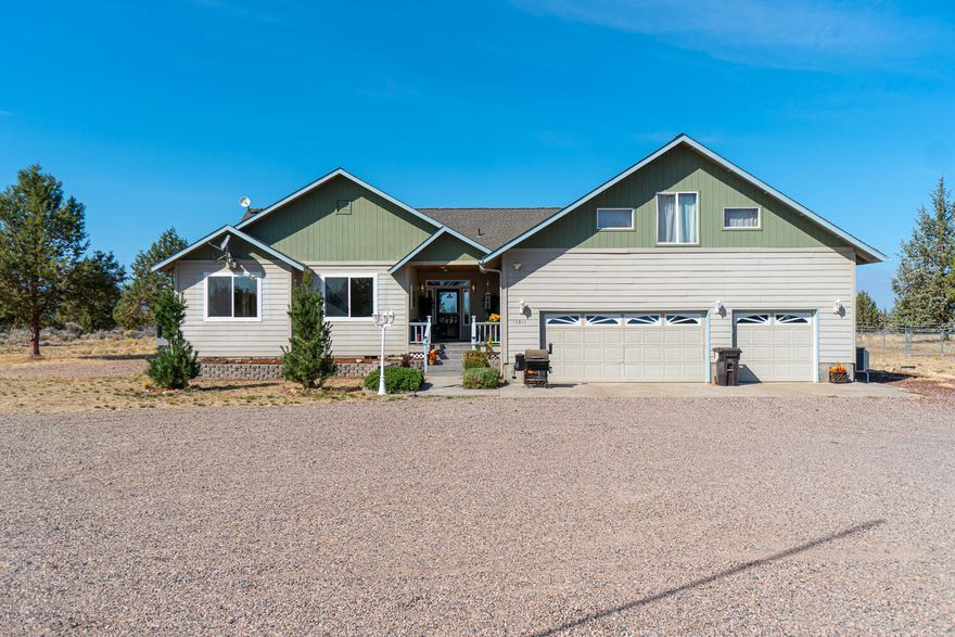 Amazing Mountain Views are just the beginning. Set between the Deschutes and Crooked River Canyons, on over 5 acres and backs to public lands. A contemporary ranch style home with all the rooms except the bonus room are on the main level. An inviting open floor plan, 9' ceilings, updated waterproof laminate plank flooring throughout the main living areas, new storm doors, an 8' patio slider door and 4-ton Heat pump with UV-filter are just a few of the amenities offered. The kitchen has updated slab granite counters, full tile backsplash, pantry & breakfast bar. Enjoy spectacular sunsets and mountain views from the breakfast nook or choose between cozy evenings or football weekends with friends in the oversized great room. There is even a certified wood burning stove for added comfort. Above the garage there is a bonus room/4th bedroom with a mini split heat pump. In addition to the oversize 3 car garage, there is a 36x48 shop with concrete floor, electric with 220v power.
