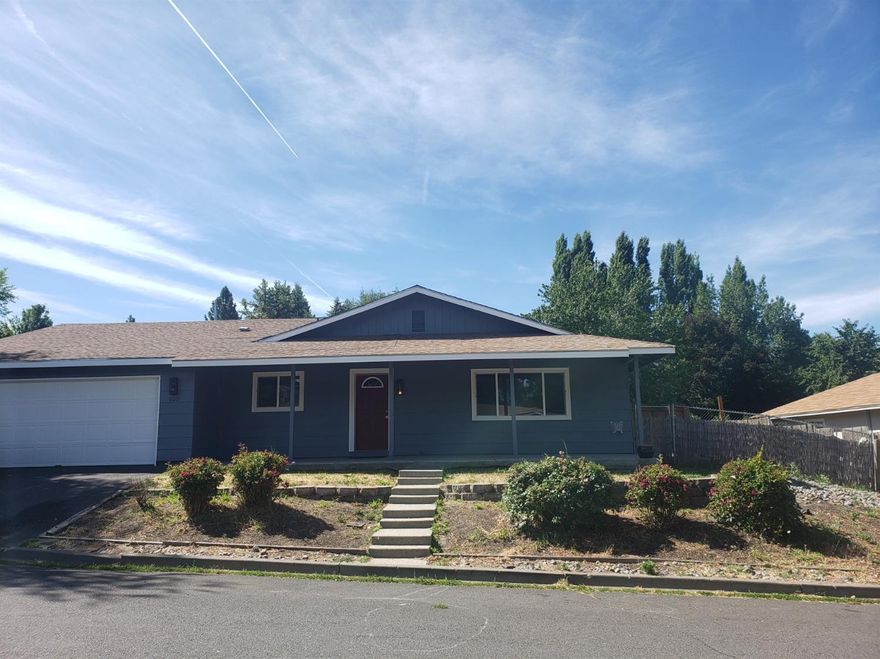 Hard to find 4 bed 2 bath clean home in great area, especially for this price! On a corner lot with a fenced back yard, cute deck and garden area, what more could you ask for? Good sized separate living and family room. The kitchen is open to the living room with a sliding glass door to the covered deck making it easy to entertain and plenty of room to spread out. Seller states the gas fireplace in living room heats most of the home very well. Wall heaters are just an additional if needed.