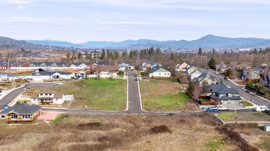 Building lot in the desirable Emerald View subdivision. If you're looking for a family friendly neighborhood then look no further! This lot is conveniently located near the scenic Eagle Point Golf Course, created by Robert Trent Jones, Jr., ranked as one of the top-15 Best Places to Play'' by Golf Digest. Restaurants, shopping, parks and walking paths are all conveniently located close by, and all just 10 miles to Rogue Valley International Airport. Bring your Builder and start creating the home of your Dreams today!