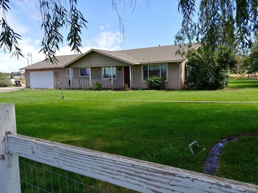 Stunning 360 views of Smith Rock and the Cascades from this 2.97 acre hobby farm in Terrebonne, OR! Outside, you'll enjoy the 30x40 2-bay shop, chicken coop, hay barn, room for horses and all your toys, and 2.5 acres of COI irrigation rights to grow your own crops. Inside the 2,736 sq.ft., 5 bedroom, 2.5 bath home, entertain your guests while taking in the views from the great room and open kitchen equipped with a glass cooktop, double oven, breakfast bar/island and tons of counter space. The spacious master suite offers a double vanity sinks, walk-in shower and access to the rear deck.
