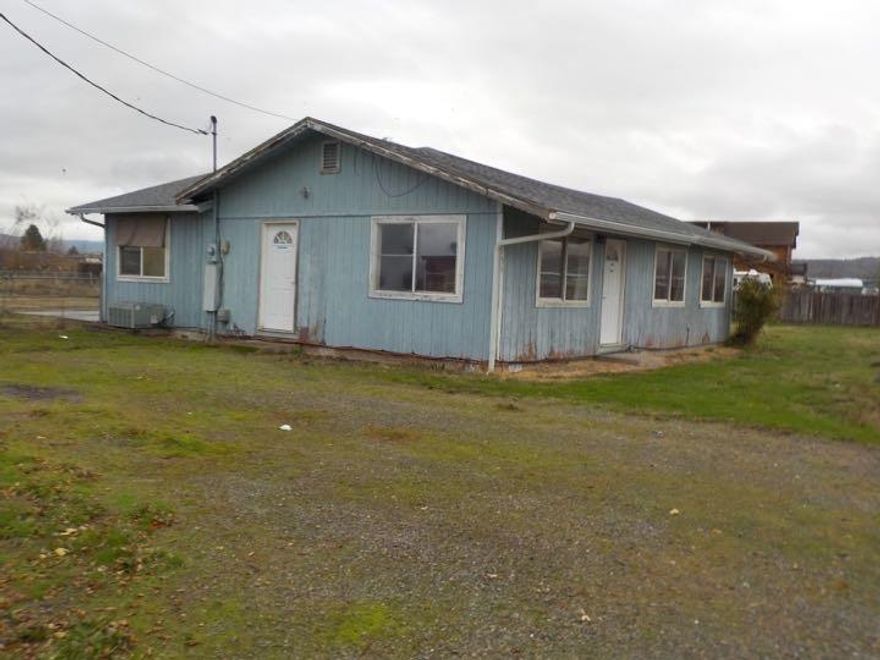 Fixer upper opportunity here. Great piece of property in a wonderful location near Crater Lake hwy and the Rogue Valley Airport that is all level and has a huge detached garage/ shop. Needs some repair but the bones are so good and it is so much here for the price.