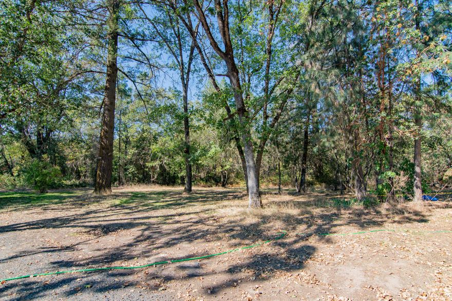 This is a beautiful private two plus acres with a well.  The property is fairly heavily wooded but is level.  It is on a flag lot with access off of 6170 Lower River Road .