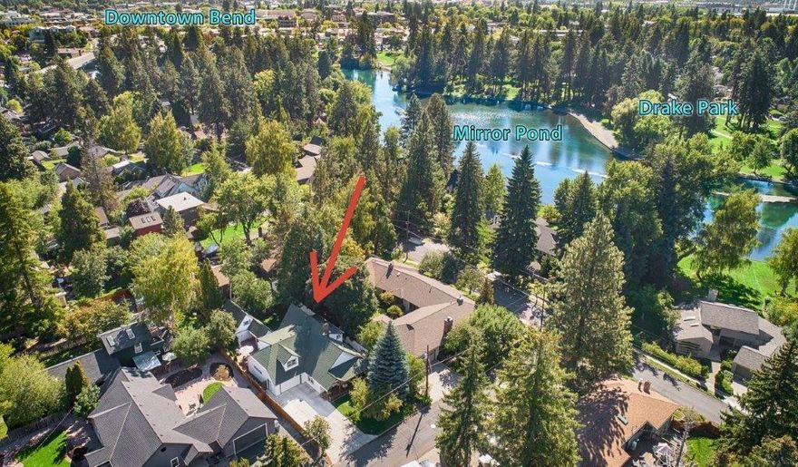 This masterfully updated home offers numerous possibilities for a private retreat right in the heart of Bend. The property includes a carriage house, added garage & Bonus room w/balcony, offering ADU potential for creating extra income or a perfect hideaway for your guests. Located in the exquisite Boulevard section close to the Deschutes River, Downtown & Westside amenities, vibrant Bend is just outside the front door! Interior appointments include master suite w/remodeled bathroom on the main level, oak floors, quartz counters, custom hickory cabinetry, full-sized built-in fridge/freezer in kitchen, vaulted ceilings, wood burning fireplace in the living, gas fireplace in the dining room, laundry chute, 580-SF basement w/storage rooms, wood wrapped vinyl windows, forced air heat & A/C. The tranquil backyard is fenced & includes an inviting paver patio, perfect for morning coffee or dinner al fresco! 30-amp RV hookup, plus a pull-through garage round out this captivating property.