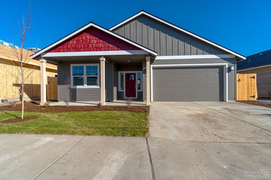 Premier 55+ mature living community in beautiful NW Redmond. Situated just minutes from amenities, medical facilities, the Dry Canyon, trails & parks. Well appointed home w/a comfortable Great Room style floor plan & Master separation. Open kitchen w/massive central island, Quartz counter tops, designer tile back splash, SS appliances & a gas range. Knotty Alder cabinetry & classic hardware & fixtures. Luxury wood look flooring throughout main living space & carpet in the bedrooms, vinyl plank in the baths. Spacious living room w/gas burning fireplace & plenty of space to entertain the whole family! Master Suite features a tray style vaulted ceiling & huge walk in closet, dbl vanities in the bath & glass shower door. High efficiency gas furnace & water heater, pre wired for A/C. Double car garage w/wi-fi garage door opener, front landscaping, auto sprinklers & fully fenced too. Additional floor plans available - call a REALTOR for details!