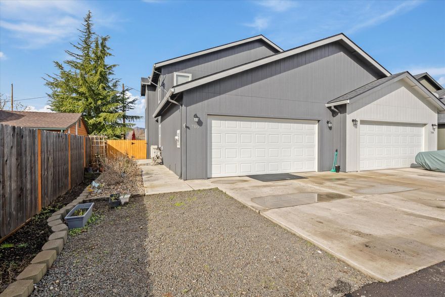 If an EZ-Own home is what you are looking for, Welcome Home! From the 2021 year built to the low-maintenance grounds, this nearly new Townhouse is ready for you to enjoy ''No Worries'' home ownership. Features include: Laminate wood 1st floor and carpeted 2nd story, nearly new 2021 construction, granite countertops throughout and textured ceilings/walls, a beautiful darkwood kitchen with island, eating counter and stainless steel appliances (INCLUDED in sale PLUS washer and dryer). A privacy fenced back yard patio, indoor laundry room and 2-car garage round out this perfect EZ Own Townhouse on the West end of Medford just minutes to shopping and Jacksonville.