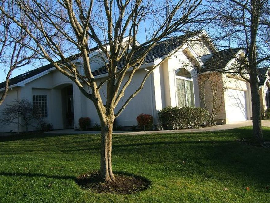Beautiful, East Medford move-in ready home at quiet end of Alder Creek West gated community. This spacious 1975 sq. ft. split floor plan features a wonderful vaulted entry & LR w/gas log fireplace and formal DR area all with lots of natural, windowed light. The all-appliances-stay kitchen/great room features a long eating bar and a slider out to the covered patio. The private master suite on one side of the home boasts a double vanity, jetted tub, shower and a separate water closet as well as a large, walk-in closet and slider to a 2nd patio. The split plan affords 2 other bedrooms or a den/office & a bedroom, full bath & a laundry room on the other side of the home. Windows throughout flood the home with light and this property is meticulous inside and out. There's a 2-car garage with pull down attic storage and a utility sink for clean-up before coming inside! This is a total package lovingly cared for by the original owner and ready for new owners now! Call to tour.