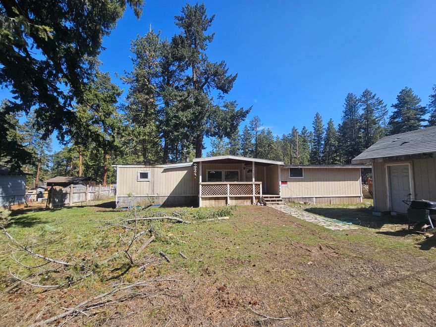 Spacious 1-Acre Property with Shop & Fixer-Upper in Desirable Keno! 3 Tax lots!
Endless potential awaits on this 1-acre property, featuring a large shop/garage with a carport, and a manufactured home in need of TLC. 
Previously home to two manufactured units, this property offers exciting possibilities - whether as a multi-family residence, an investment opportunity, or a fresh start for the right visionary. With two septic systems and existing electric onsite, much of the groundwork is already in place! The seller had talked with the county at one time about putting 3 homes on the property! Located in a sought-after neighborhood and within the Henley Middle and High School districts, this is a rare chance to create something special. Don't miss out on this opportunity! The existing home might be salvageable but might need to be torn down. It is up to buyer to do their own due diligence on the condition of the existing home and property.