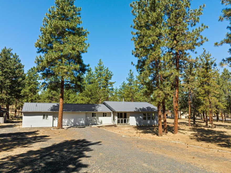Only 6 miles North of the town of Sisters. Charming and endless opportunity in this one level 3 bedroom/3full bath home with a very private setting. Heated garage and additional studio, office, or master suite adjoining and included in total sq footage. Shed/storage building with large covered area. This property could be an ideal home set up with an ADU!