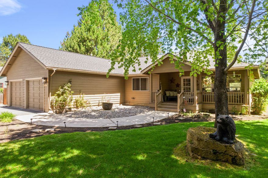 Large back yard that is fully fenced with lush grass.  Walk inside this tastefully updated home and be wowed by the updated kitchen, flooring, counter tops and more! 3 large bedrooms, and two full bath's all on ONE level. Great room with fireplace and the kitchen has two eating area options with lots of natural light. Large deck with outdoor fireplace, hot tub, storage shed and lots of parking for all your Central Oregon toys. Nicely landscaped front yard with mature trees and full two car garage. Bright and light home SO close to all Bend has to offer, yet you feel like you are in the country.  This is a must-see home; it will not last long.