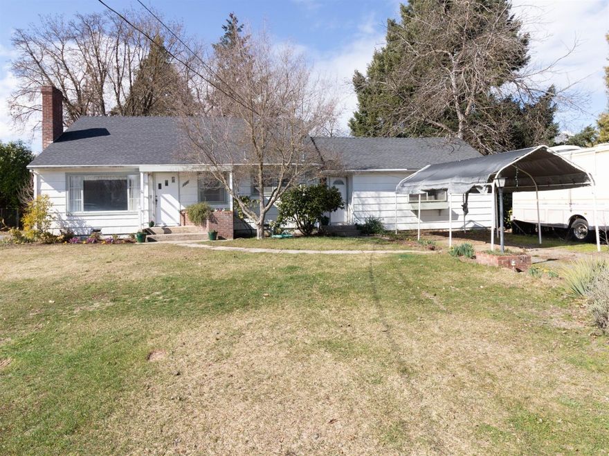 Beautiful, Peaceful Fenced Property on a Closed-End quiet Country Lane - Country feel yet close to town- Huge 0.44-Acre Lot with mature shade trees & shrubs, and Medford Irrigation Rights & 3 Detached Shops. This home has never been on the market before, originally custom-built by the Seller. Great home with tons of potential, New carpet in living room and 1 bedroom. Oak hardwood flooring under the carpeting throughout the home, a HUGE extra family room, and an excellent Well (per Seller)! Plenty of room to park your large RV. You won't want to miss this opportunity, bring your Buyers by Today.
