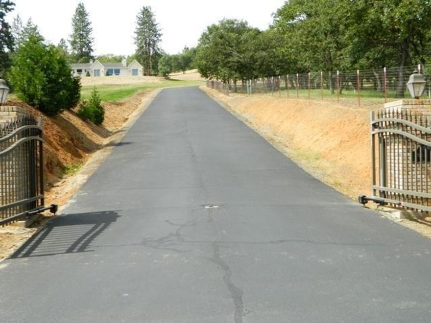 Exceptional location in an area of exceptional homes. Wonderful mountain and city views. Close to Jacksonville. Multiple wells with great flow and a 2,000 holding tank. Septic installed. Power to the property line. Ready to build. Irrigated through MID. This is THE rural neighborhood you'll want to build in. Not many lots left in this great area. Call for your tour today!