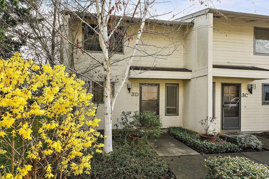 Charming townhome in a great neighborhood in East Medford! This home has 2 bedrooms and 1.5 bathrooms. The kitchen has lots of cabinets, dishwasher, refrigerator and a tile floor. The living room is very large with a big window for natural light and a slider that opens to a patio and a fenced rear yard. Upstairs there is a center laundry room and two bedrooms. The larger bedroom has a slider to an upstairs deck with a lovely view and extra storage. The upstairs bathroom also has a tile floor. There are solar tubes in the hallway and upstairs bedroom. This is an end unit so on the one side it is surrounded by trees and grass and gardens. The unit has it's own carport for covered parking. Affordable low maintenance living.