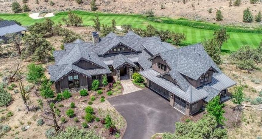 Beautiful custom home on double lot in Brasada Ranch. Mountain and golf course views, in addition to easy proximity to all of Brasada's amenities. Established vacation rental income...sold fully furnished.