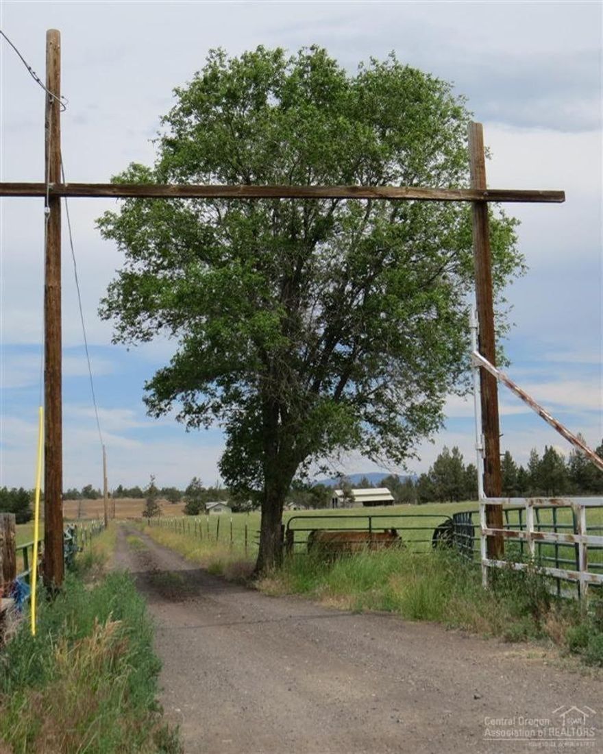 This 9.81 Acres has 9 acres of irrigation, fenced and ready for horses, cows, you name it. With a comfortable 1656 Sq Ft home, 3 bedrooms 2 baths with a great room, 528 Sq Ft Deck for entertaining on with Shade Trees, Barn 3,600 sf' Plus a 420 sf' storage, 528 sf' Shop, Most of property is in pasture. Zoned UH10. Property abuts a large subdivision in the back, potentially could be subdivided.