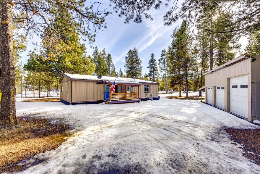 Discover the perfect blend of comfort and quiet living with this 3-bedroom, 2-bathroom home, set on 1.17 acres in the peaceful surroundings of La Pine. Built in 1987, the one-level home offers an easy and functional layout, ideal for those seeking quiet and convenience. Vaulted ceilings, a primary suite, and well-appointed, spacious bedrooms make the most of the 1296 sq ft. Open concept living, dining, and kitchen areas create an inviting atmosphere, while ample storage and a dedicated laundry room add to the home's practicality. The natural wood touches, large windows, and sliding glass doors welcome the outside in.
There's plenty of space for all of your hobbies and toys in the 3-car garage, carport, and tool shed.  Or use it as a shop, or additional storage. RV parking makes it easy to accommodate an adventure-ready lifestyle. Nestled in a wooded setting, this property offers the privacy of country life mixed with modern convenience.