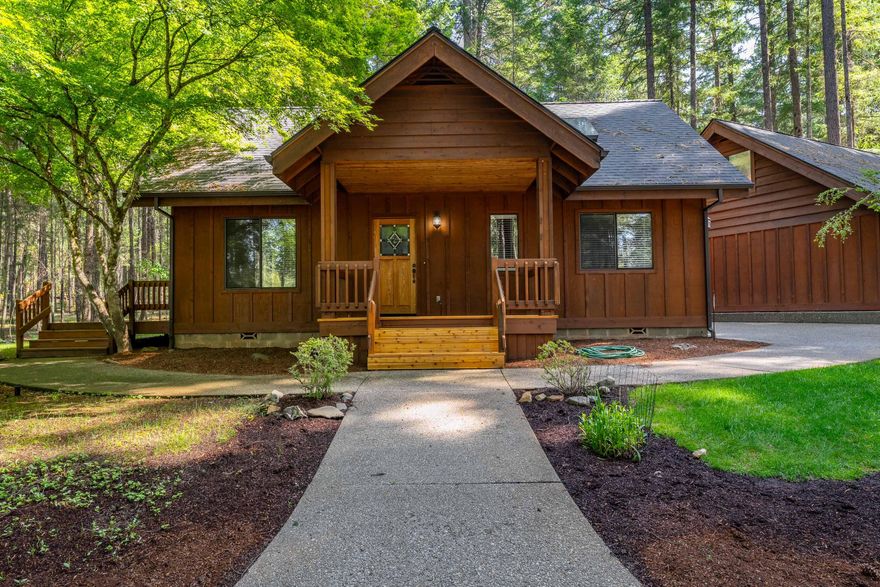 Welcome to your private woodland retreat an idyllic 1,296-square-foot home, built in 1989, tucked beneath towering evergreens on 2.51 secluded acres. Thoughtfully designed to capture the magic of forest living, this two-bedroom, one-bath sanctuary melds charm with modern comforts. Key Features: Vaulted Ceilings, oil heater, new stainless-steel appliances, tile kitchen counters, detached 2-Car Garage with a non permitted finished room above with 1/2 bath.