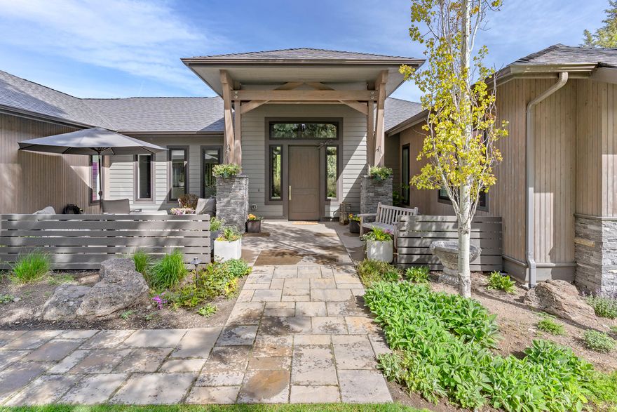 Welcome to luxury and elegance in this single-story home nestled in the coveted Tetherow Resort community! This stunning 3035 square foot home boasts three spacious bedrooms, each with its own ensuite, plus a dedicated office for all your professional needs. Meticulously built in 2016, this home features an inviting open floor plan, highlighted by a spacious kitchen island—perfect for entertaining guests or enjoying cherished family dinners. With a generous 3-car garage spanning 1170 square feet, there's plenty of space for your vehicles and hobbies. Enjoy resort-style living in a beautiful setting with the convenience of backing onto a 50 foot greenbelt. Situated on a coveted corner lot, the home's beautiful entryway sets the tone for the elegance and comfort found within. Don't miss your chance to make this dream home yours!