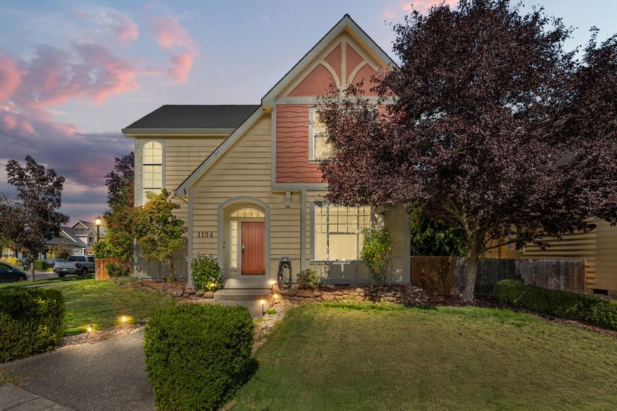 Beautifully designed 2000+ sq. ft. home in the award-winning Twin Creeks community of Central Point! The spacious living room with a decorative fireplace creates a cozy gathering space, while the open kitchen shines with granite counters, gas range, custom cabinetry, and inviting dining area. A large office, powder room, utility room, and abundant storage add everyday convenience. The luxurious primary suite offers a tray ceiling, expansive walk-in closet with built-ins, dual sinks, solar tube, and a walk-in shower. Generously sized bedrooms provide comfort for family or guests. Enjoy outdoor living with a covered patio, pergola, and alley-access finished two-car garage. With a central VAC system and thoughtful upgrades throughout, this home combines elegance and functionality in one of Southern Oregon's most sought-after neighborhoods.