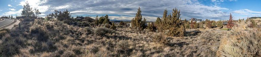 Don't miss this rare opportunity to build your custom home in the highly desirable Yarrow neighborhood of Madras. This spacious .39-acre double lot offers grand territorial and mountain views, providing an ideal setting for a future home designed to take full advantage of Central Oregon's natural beauty. Located in one of Madras' most thoughtfully planned communities, this property offers a quiet residential feel while remaining close to parks, trails, schools, medical services, shopping and the Swim Center. With generous dimensions, the double lot allows ample room for a variety of home styles, outdoor living areas, gardens or additional structures (buyer to verify). This is a prime opportunity to secure two unobstructed view lots in one of Madras' most sought-after locations. Bring your builder and your vision.