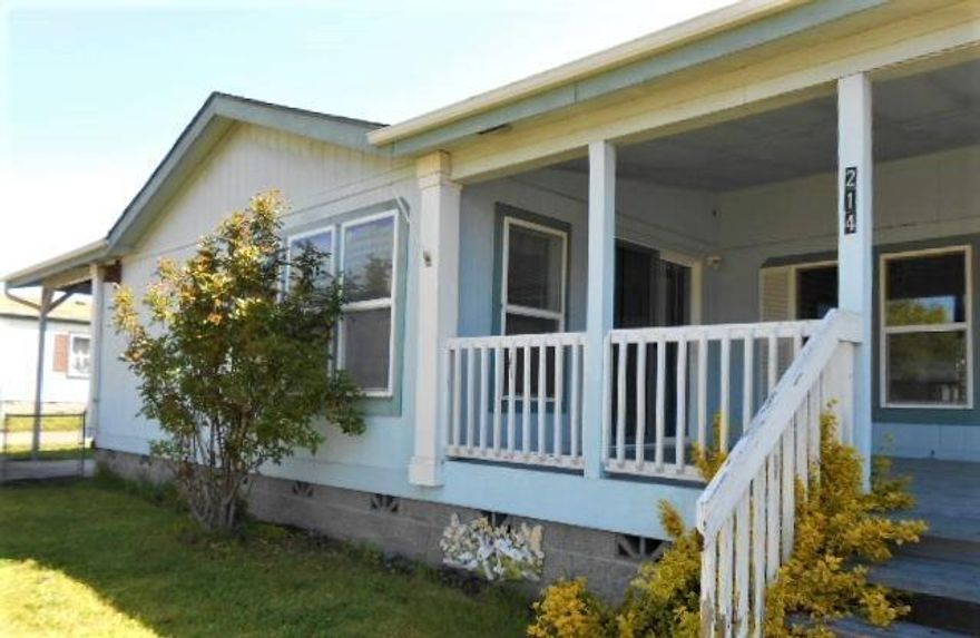 This large triple wide Home is located on a larger lot, fenced, with lawn. Enjoy your quiet time from one of two decks. Larger covered carport opens into home for convenient loading and unloading. Backyard is large, with a larger shed/shop. Inside you have great open floor plan. 3 bed/2 bath, larger laundry room which opens to either bedroom or kitchen side Kitchen is bright, large and opens to spacious dining and very large separate dining/ living room. Master offers long step in closet, bath offers garden tub and shower. This home is available with the possibility of up to $9000 improvement credit with accepted offer. Contact for additional information while this great opportunity is still available