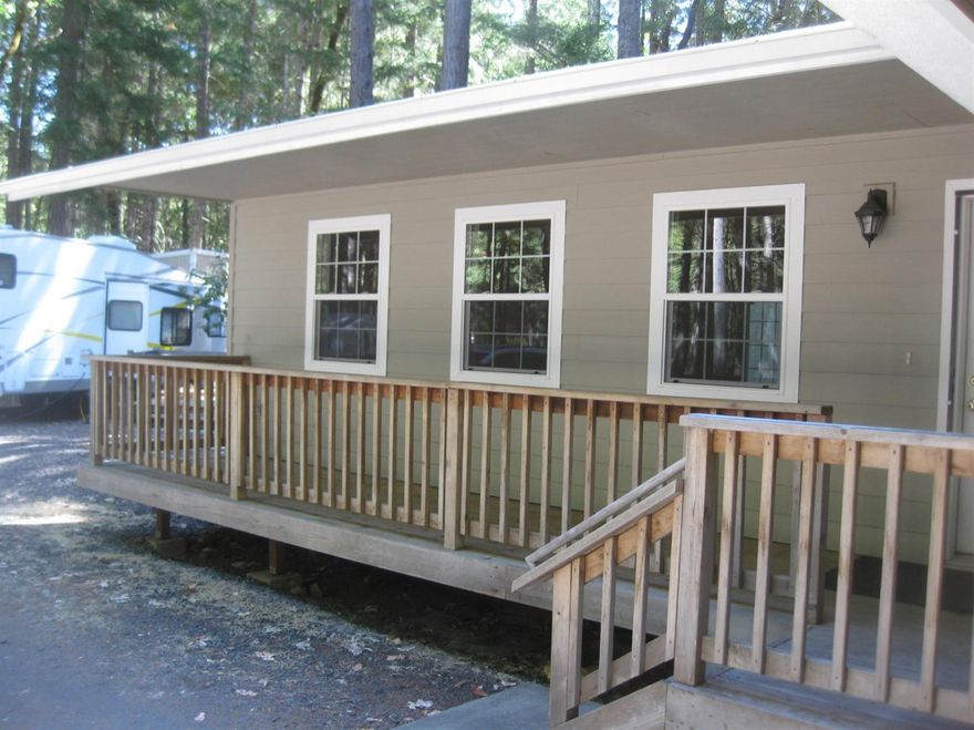 Beautiful home in the woods! Spacious, clean, modern ranch with over sized garage and quiet wooded isolation. A large barn comes complete with a Studio apartment for additional income potential. There is also an Artist's Studio separated from the house with a wooden walkway. Feel inspired to make this your home. The main house has 6 inch outer walls, open-concept living space and a jetted tub in the master bath. This house was built for comfort and is well insulated for year round enjoyment. Great neighborhood and Idyllic setting.