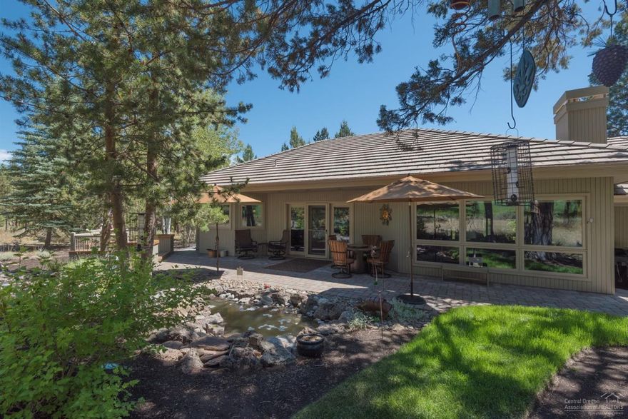 Meticulously built single story on a quiet cul-de-sac close to all Bend and Central Oregon amenities. Master on main with open layout in all rooms. Located on 18th fairway with beautiful water feature and well kept landscaping. In floor heating system provides uniform comfortable heat throughout the home. Concrete tile roof with stone accents on the exterior, along with light wood tones give the home a warm welcoming feeling on both the exterior and interior. Steam/rain shower in master.