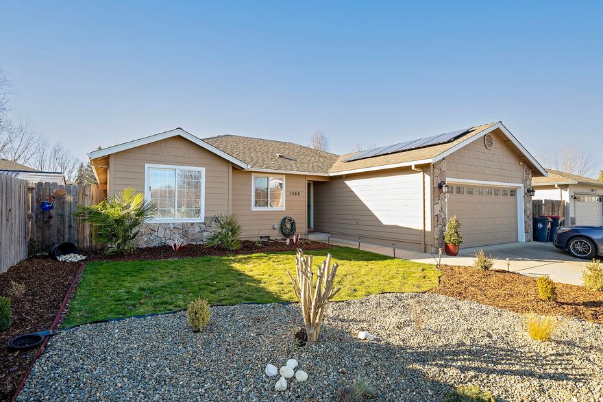 This Meticulously kept 3 bed 2 bath home with solar panels that seller has paid in full, dropping your electric bill to approx $12.00 per month. Home has a cheery Bright open concept, Beautiful kitchen with granite counter tops open to the Great Room. Large primary bedroom with slider going out to back yard patio. Large back yard with tall fencing on all 3 sides making it very private, nice size patio that goes across the whole back of the home. This house is move in ready.