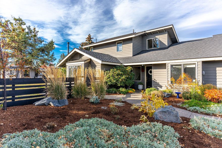 Welcome to your West Tumalo dream property -a beautifully updated home with mountain views on 9.91 acres-7.5 irrigated within the desirable Bend-La Pine School District. The school bus stops at the end of the driveway. 1,824 sq. ft. 4-stall barn ideal for horses, hobbies, or storage, along with newly seeded fenced pastures. The professionally landscaped backyard is an entertainer's paradise — complete with a tranquil pond and deck, fire pit, orchard, chicken coop, 2 RV hookups, EV charger, garden shed, and a custom outdoor pizza oven. Host unforgettable gatherings at the classic farm table, which seats 20 and is surrounded by the calming scent of over 1,500 lavender plants with income-producing potential. All the hard work is done. Move in and take this property to the next level. Kids (and kids at heart) will love the treehouse with stunning mountain views. Country living just minutes from town at this charming Tumalo property close to trails. Seller is a licensed broker in OR.