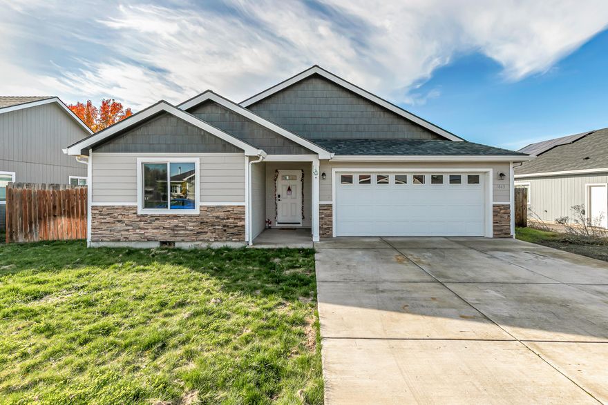 Come enjoy this 5-year-old entry level home where laminate floors grace the main living areas under a vaulted ceiling. It boasts a split floor plan with the bedrooms separated an island kitchen with granite counters and stainless appliances. Outside has plenty of room for RV parking and the fenced backyard offers space for your pup. Home is located with easy access to Medford and Eagle Point. Call today to see this home before its gone.