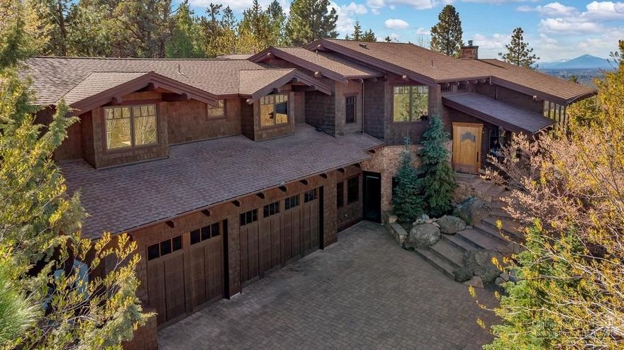 Exquisite NW Style custom home by Gary Norman is an extraordinary blend of sophistication, elegance & pure luxury w/incomparable craftsmanship, designer finishes/fixtures that are beyond extraordinary. Cascade Mtn, City & Smith Rock views. Versatile floorplan offers a variety of living spaces inc. separate guest quarters. Award-winning Chef's gourmet kitchen, extensive walk-in pantry/built in desk area, baking & beverage centers, Wolf range, Subzero refrigerator, slab counters, breakfast bar. Dining area leads you out to your incredible back patio outdoor living space w/built-in kitchen, gas fireplace, extensive landscaping-home features 4 lovely water features. Master & Ensuite w/gas fireplace, private patio, radiant floor heat & jetted tub. A total of 4 bdrm suites & 5 baths 3 car heated garage w/partially heated driveway. Guest suite with office/wine room, family room, bedroom, full bath & kitchenette w/elevator access to main level. Rivers Edge & Awbrey Glen Golfing nearby.