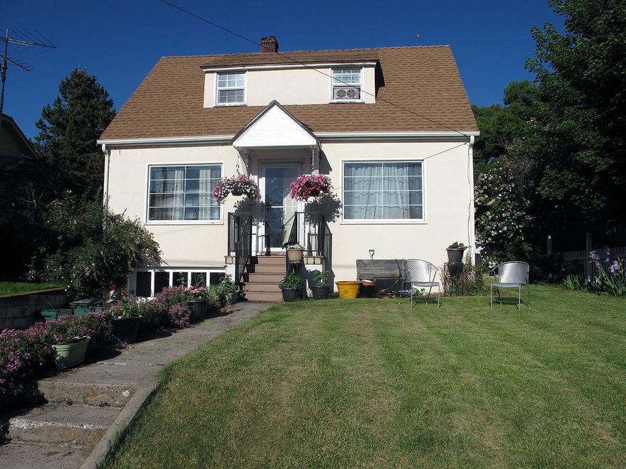 This home has been well cared for and offers an updated kitchen and bathrooms, plus a bedroom and half bath downstairs, and two bedrooms and a full bath upstairs. Loads of character including wood floors, angled ceilings, built-in desk and more. New fencing and garden shed in back with a shaded dog run.