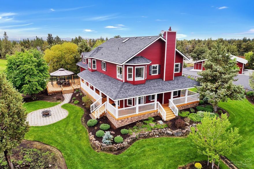 Beautiful updated Country Estate with mountain views and high end finishes. Gorgeous designer kitchen, stunning master suite w/ soaking tub, office, and bonus room. This home takes advantage of its private setting while offering an abundance of natural light and stunning outdoor space for entertaining! Several outbuildings; ADDITIONAL 2088 sq/ft finished office/guest/hobby quarters w/ kitchenette and bathroom, attached 2 car garage, greenhouses w/ irrigation and heat, horse barn w/ private stalls, shop, storage buildings, and custom chicken huts. Minutes from town, this remarkable farm is fully irrigated and fenced for horses. This home and property are truly one of a kind!