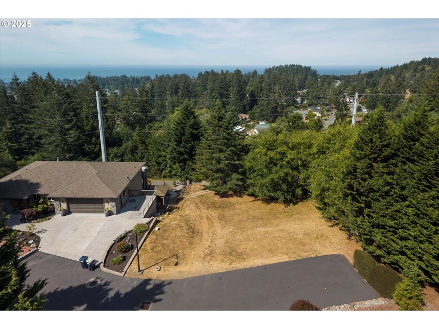 Build your dream home on this excellent cul-de-sac lot, ideally situated in an upscale gated neighborhood just minutes from downtown Brookings, stunning local beaches, schools, and shopping. This community requires a minimum home size of 2,000 sq. ft. and does not allow manufactured homes. HOA documents and CC&Rs are available upon request. Buyers are encouraged to conduct their own due diligence with the City of Brookings regarding utilities, utility fees, building requirements, and any other considerations to ensure the lot aligns with their intended use.