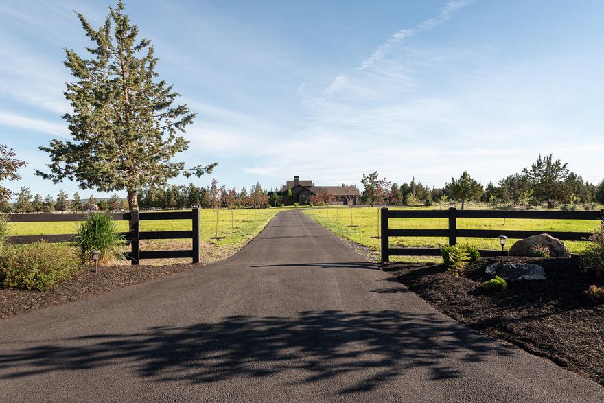 This is a remarkable home & land package in Bend!  Imagine life with these cascade mountain views!  Relax on the covered patio facing the mountains, your pasture & surrounded by bird life.  Dine on the paver stone patio under the gazebo near your water pond.  Hunker down inside this exquisite AllyBrooke custom home built in 2016 with a wood burning fireplace, an open great room, a spacious owner's suite, abundant with natural lighting while your guests can relax in the opposite end of the home or in the upstairs bonus room with a full bath.  Tinker in the large triple garage, or in the 920 square foot detached shop with heat & water.   Keep things growing with the 4 acres of COID irrigation & all available on a paved road and tree lined driveway.   Nearly fully fenced and includes a corral, loafing shed, irrigation equipment and fence panels, this truly is an amazing & magical place!  All with an easy drive, just 11 minutes to medical and shopping, 18 minutes to downtown Bend.