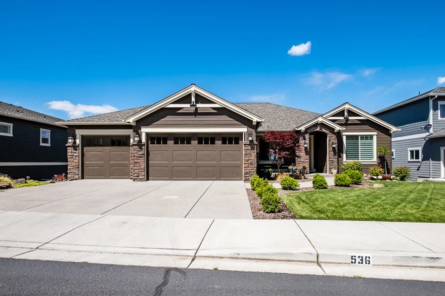 This gorgeous home offers incredible views of the Rogue Valley, and on many occasions, offers sightings of local wildlife.  One of the favorite things the seller will miss the most is a pair of Red Tailed hawks honoring you with regular fly-byes. Typically accompanied by local geese, deer and other animals.  The home is filled with exquisite amenities, which include high, open beam ceilings; wood floors; alder wood cabinets; quartz counter-tops; and much more. The open great room style living is perfect for entertaining and will make you feel at home right when you arrive.  As you enter this home you will be welcomed by a rocked archway that leads into the great room where you can enjoy the warmth of the gas fireplace.  The kitchen has 5 burner gas stove, island, wine cooler, and walk-in pantry. Enjoy the twinkling city lights at night when you step out onto the spacious covered deck.  The master suite boasts beauty as well.  Master bedroom and office on the main level.